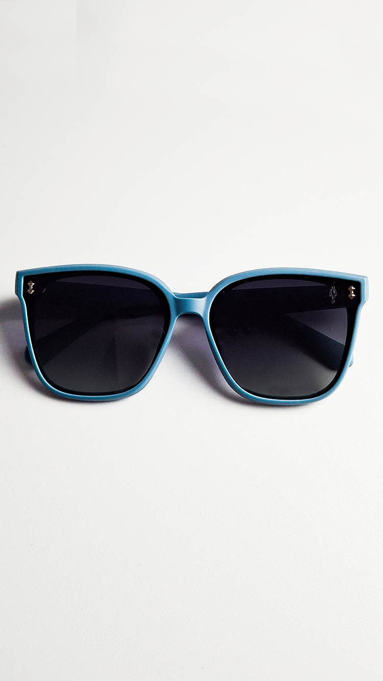 Óculos de Sol Azul Claro Lente Preta RM1015